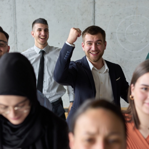 a-diverse-team-of-business-professionals-ecstatica-2025-01-15-16-23-10-utc-scaled