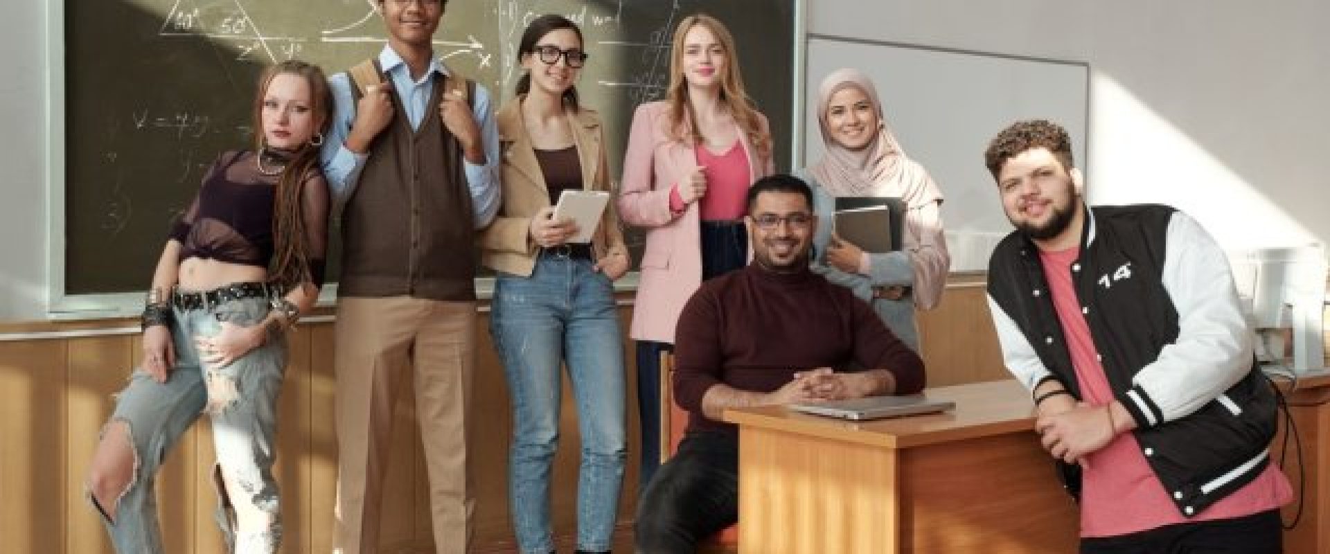 Happy international students celebrating their success in an English course at Malaysia's leading language center